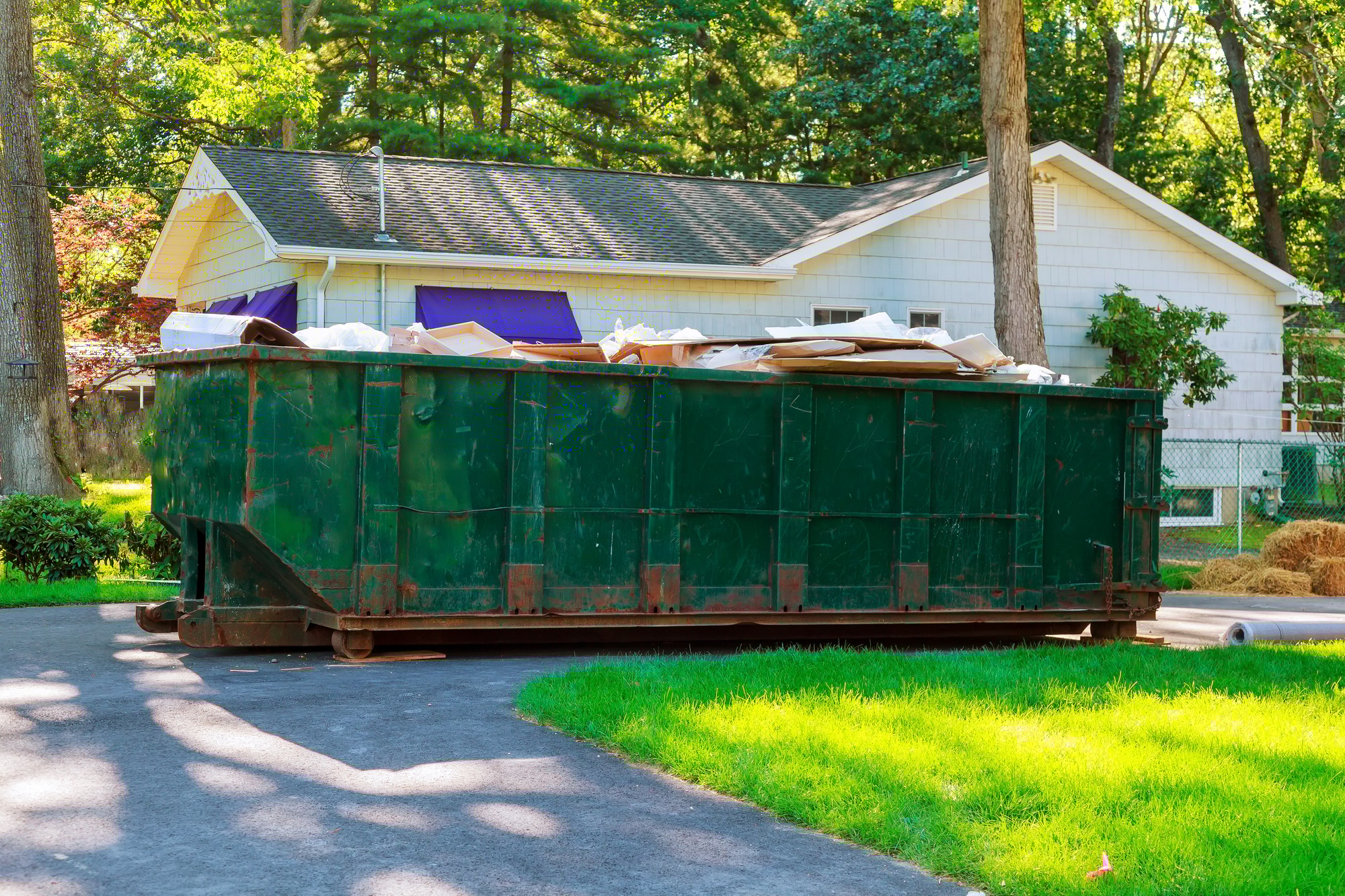 Dumpsters being full with garbage container trash on ecology and environment
